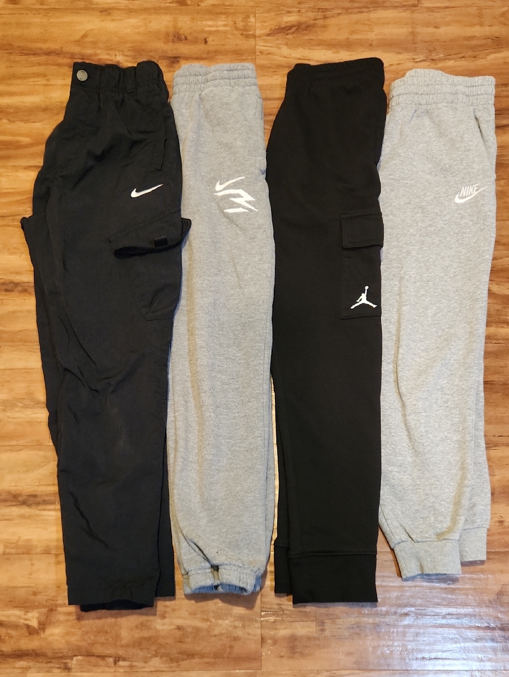 All 4 Pairs Nike Kids Black & Gray Jogger Pants Variety Pack